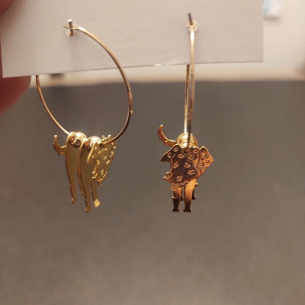 Gold dog earrings